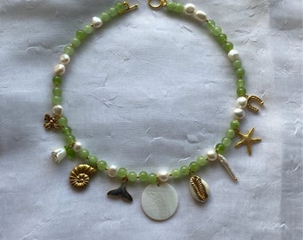 Collana con ciondolo con peridoto e perla
