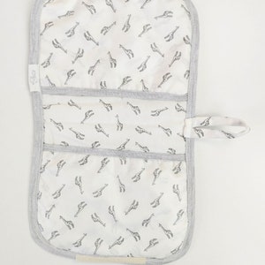 BABY Soft Pocketed Changing Mat for Effortless Diaper Changes. It can be folded into a bag and carried easily. image 8
