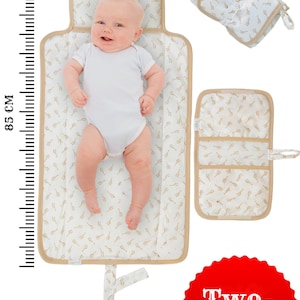 BABY Soft Pocketed Changing Mat for Effortless Diaper Changes. It can be folded into a bag and carried easily. image 10