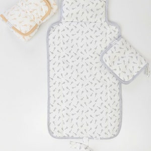 BABY Soft Pocketed Changing Mat for Effortless Diaper Changes. It can be folded into a bag and carried easily. image 6