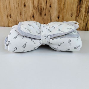 BABY Soft Pocketed Changing Mat for Effortless Diaper Changes. It can be folded into a bag and carried easily. image 3