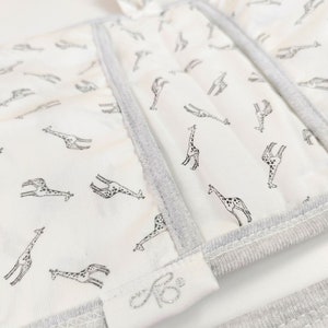 BABY Soft Pocketed Changing Mat for Effortless Diaper Changes. It can be folded into a bag and carried easily. image 7