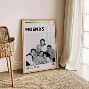 May include: A black and white poster with the word "FRIENDS" in bold, white letters. The poster features a group of six people, including Jennifer Aniston, Courteney Cox, Lisa Kudrow, Matt LeBlanc, Matthew Perry, and David Schwimmer. The poster also includes the year "1994" in the bottom right corner.