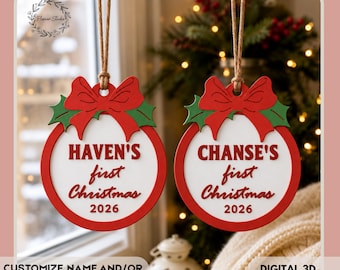 May include: Two round Christmas ornaments with red borders, green holly leaves, and red bows. The white centers feature red text reading Haven's first Christmas 2026 and Chanse's first Christmas 2026. Each hangs from a brown twine string.