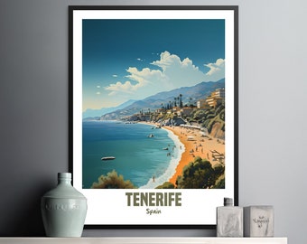 May include: A vintage travel poster depicting a picturesque beach scene in Tenerife, Spain. The poster features a blue sky with white clouds, a sandy beach, and a turquoise ocean. The text "TENERIFE" and "Spain" is printed in brown at the bottom of the poster.