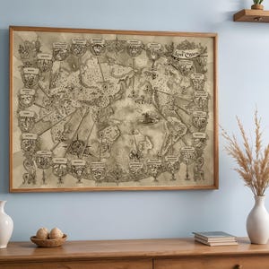 May include: A framed map titled "Lost Cities" with a sepia-toned design. The map features detailed illustrations of various locations, connected by lines. The frame is made of light brown wood. The map is displayed on a wooden cabinet.