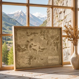 May include: A framed map of Rivendell, the House of Elrond, in a wooden frame. The map is tan with detailed illustrations and text. The frame sits on a wooden surface near a window with a mountain view. Two white vases with dried plants are on the right.