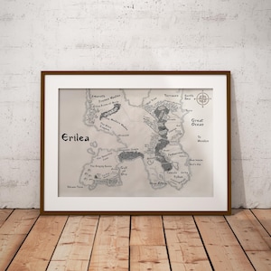 May include: A black and white map of the fictional land of Erilea. The map shows various geographical features, including mountains, forests, rivers, and lakes. The map is framed in a brown wooden frame.