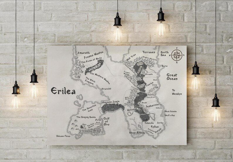 May include: A black and white map of the fictional land of Erilea, with various regions and locations labeled. The map is surrounded by a white border and is set against a white brick wall.