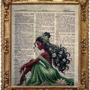 May include: An art print in a gold frame, depicting a woman in a green dress on a dictionary page. The woman has dark hair with floral accents. The frame is ornate. The artwork evokes a vintage aesthetic, suitable for home decor.