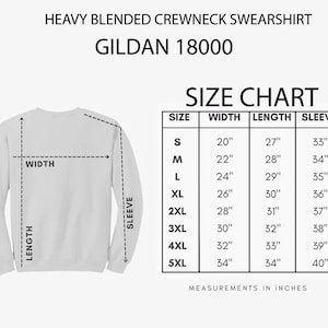 May include: Size chart for a Gildan 18000 heavy blended crewneck sweatshirt. The chart shows measurements in inches for width, length, and sleeve length for sizes S through 5XL.