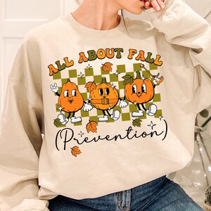 All About Fall Prevention Shirt, Thanksgiving Fall Nurse Shirt, SPT Pta Thanksgiving Shirt, Ot Shirt, Physical Therapy Shirt, OT Fall Tee