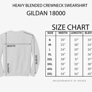 May include: Size chart for a Gildan 18000 heavy blended crewneck sweatshirt. The chart shows measurements in inches for width, length, and sleeve length for sizes S through 5XL.