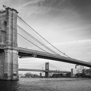 Brooklyn Bridge In Black And White Spanning Over The East River Between Manhattan And Brooklyn, New York City
