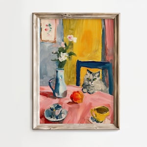 May include: A painting of a still life with a gray cat sitting on a chair, a blue vase with white flowers, a peach, and a cup and saucer on a pink tablecloth.