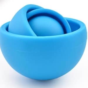 May include: A blue silicone fidget toy with a sphere inside that rotates. The sphere is also blue and is surrounded by a larger blue silicone sphere.