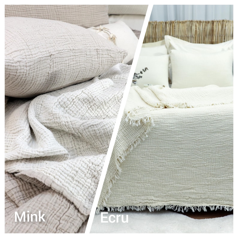 May include: Two bedding sets are displayed, one in mink and the other in ecru. The mink set includes a pillow and a blanket with a textured, crinkled appearance. The ecru set features a blanket with a fringed edge and pillows, all on a bed.