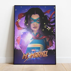 May include: A digital illustration of a female superhero wearing a blue and red costume with a purple and gold cape. The background is a purple and blue gradient with stars. The text "MARVEL STUDIOS" and "MS. MARVEL" is in the bottom centre of the image.
