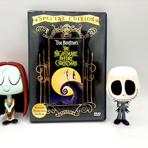May include: A DVD of Tim Burton's "The Nightmare Before Christmas" with a Special Edition label, flanked by two character figurines. One figurine is Sally, the other is Jack Skellington.