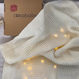 Handmade Merino Wool Knit Baby Blanket: Soft White Swaddle