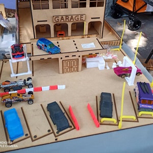 Diorama-parkeerplaats op schaal 1:64 om te vervaardigen.