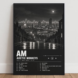Könnte beinhalten: Ein schwarz-weiß gerahmtes Poster mit einer nächtlichen Stadtansicht und einer leuchtenden Schallwellengrafik. Der Text lautet AM, ARCTIC MONKEYS, 2013, INDIE ROCK, 41:57 und listet zwölf Songtitel auf, darunter Do I Wanna Know und I Wanna Be Yours.