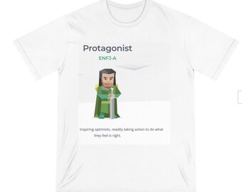 May include: White t-shirt with a green and black illustration of a person holding a sword. The text "Protagonist" and "ENFJ-A" is printed on the shirt. The text "inspiring optimists, readily taking action to do what they feel is right." is also printed on the shirt.