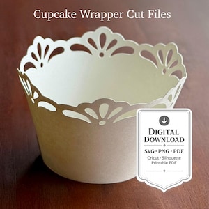 May include: A cream-colored cupcake wrapper with a decorative die-cut scalloped edge. The text "Cupcake Wrapper Cut Files" appears at the top, and a badge reads "DIGITAL DOWNLOAD SVG PNG PDF Cricut Silhouette Printable PDF" at the bottom right.