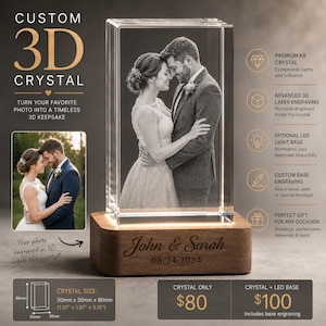 May include: A rectangular 3D crystal block featuring a laser-engraved image of a couple in formal attire. The crystal sits on a wooden base engraved with the names John & Sarah and the date 08.24.2024. The crystal measures 1.97 by 1.97 by 3.15 inches.