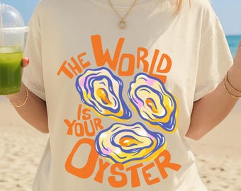 The World Is Your Oyster Shirt, Coastal Summer Tee, Beach Vacation Graphic Tee, Oyster Lover Gift, Retro Seafood Shirt
