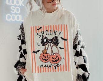 Spooky Nurse Shirt, Halloween Nurse T-Shirt, Pumpkin Bow Tee, Cute Ghost Nurse Shirt, Fall Nursing Gift for Her, Medical Halloween Tee