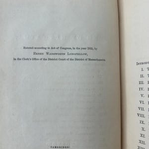 May include: Open book page with text. The text reads: "Entered according to Act of Congress, in the year 1855, by HENRY WADSWORTH LONGFELLOW, in the Clerk's Office of the District Court of the District of Massachusetts." Below, "CAMBRIDGE: METCALF AND COMPANY, STEREOTYPERS AND PRINTERS."