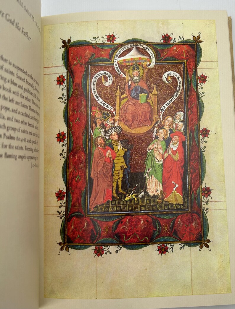 May include: A page from a book featuring a medieval illustration. The artwork depicts a seated figure with a halo, surrounded by other figures in colorful robes. The illustration is framed with a red border and floral accents.