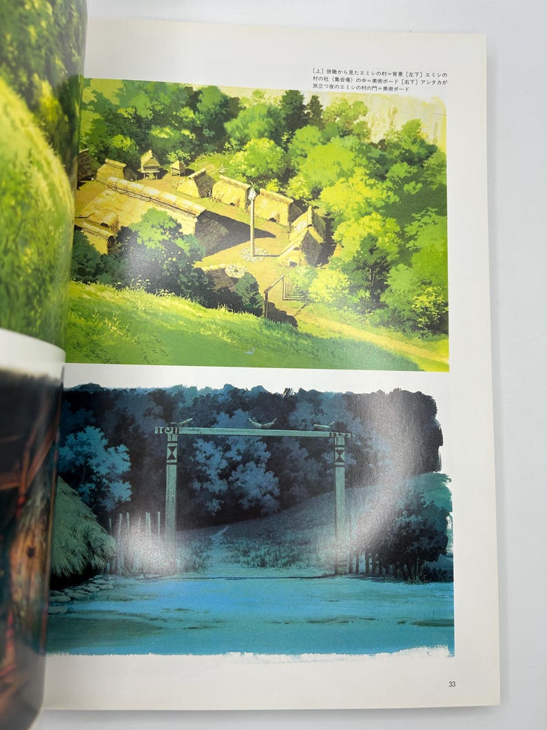 May include: A book page featuring two illustrations from Princess Mononoke. The top image shows a village with thatched-roof buildings in a forest. The bottom image depicts a wooden gate at night. Japanese text is printed at the top right corner.