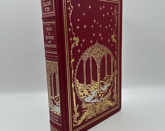 May include: A hardcover book titled "Tales of Mystery and Imagination" by Edgar Allan Poe. The book has a deep red cover with gold foil accents, including stars and an ornate illustration. The spine also features gold lettering.