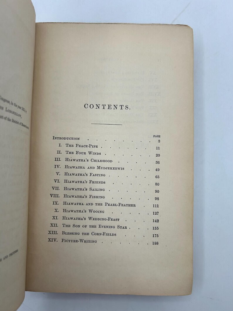 May include: Open book with the contents page visible. The title "CONTENTS" is centered at the top, followed by a list of chapter titles and page numbers. The paper has a yellowed, aged appearance.