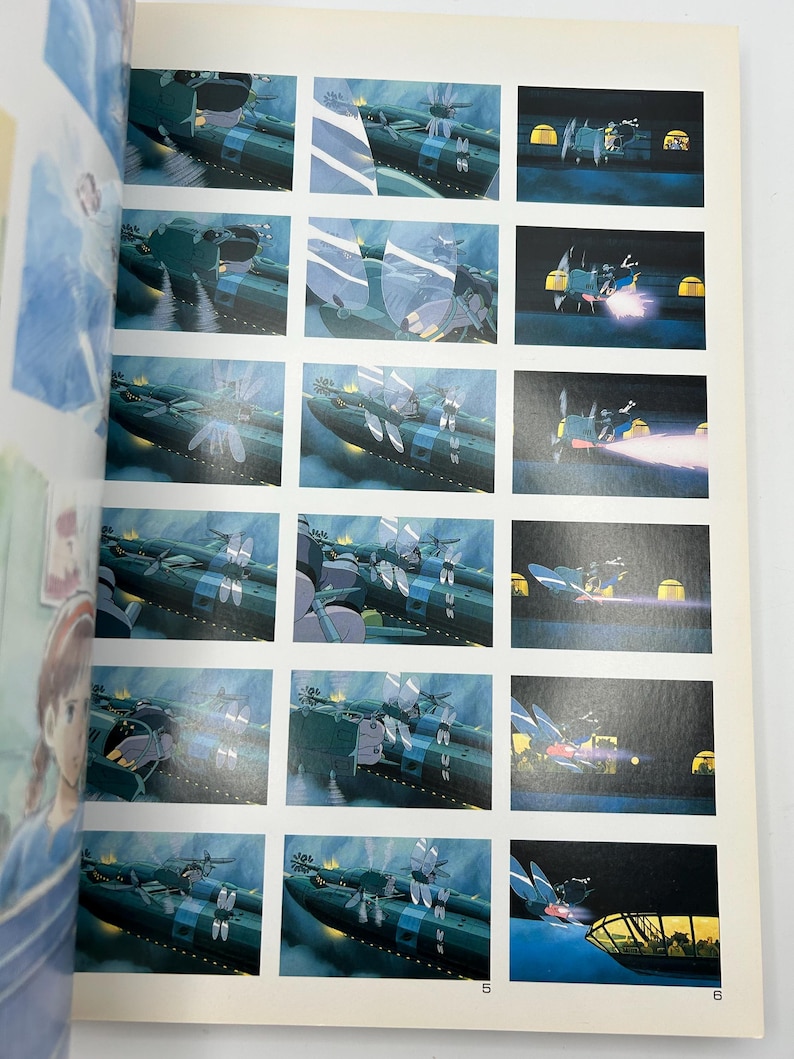 May include: A page from an animated film storyboard featuring multiple panels. The panels depict a large, dark green ship with white accents, set against a blue and dark background. Some panels show the ship in action with bright light effects.