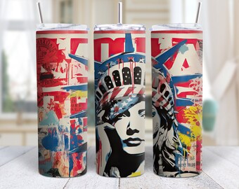 Puede incluir: Tres vasos de acero inoxidable con un diseño abstracto colorido que presenta la Estatua de la Libertad. El diseño incluye salpicaduras de pintura roja, blanca, azul y amarilla y un gráfico de la cara de la Estatua de la Libertad.
