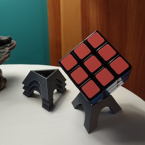 4 Puzzle Cube Stands, Stackable, Gray, Black, Durable, Cube Stands.