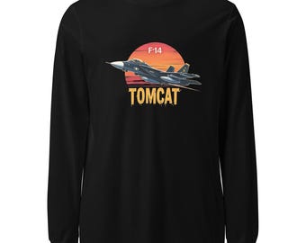May include: Black long-sleeved top with a graphic of a Tomcat fighter jet set against a sunset. The text "F-14 TOMCAT" is below the jet in yellow. A classic design for aviation enthusiasts.