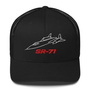 May include: Black trucker hat featuring a white outline of an SR-71 Blackbird aircraft and the text "SR-71" in red. The hat has a mesh back and a curved brim.