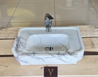 Pia de mármore lilás artesanal com furo para torneira: Bancada de banheiro em pedra natural