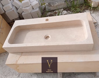 Pia retangular de travertino artesanal com furo para torneira