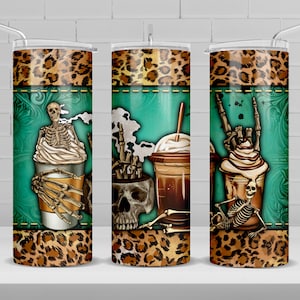 May include: Three stainless steel tumblers with a leopard print design. Each tumbler features a different design with a skeleton holding a coffee cup, a skull with bones, and a skeleton playing rock and roll.