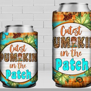 May include: Two insulated beverage holders with a fall-themed design. The larger holder features a brown and orange plaid pattern with a gnome and the text "Cutest Pumpkin in the Patch". The smaller holder has a similar design with a blue and white plaid pattern.