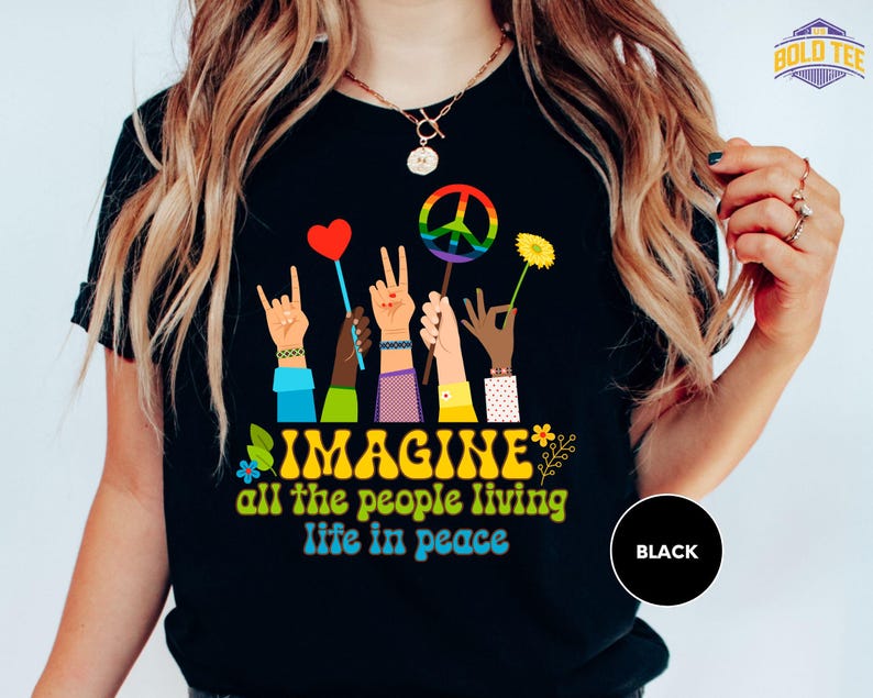 a woman wearing a t - shirt that says imagine all the people living life in