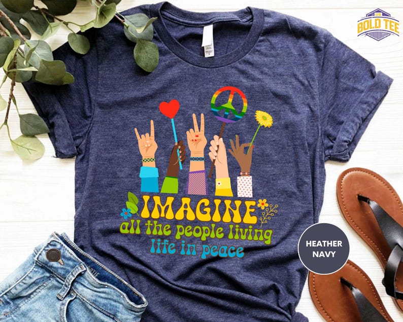 a t - shirt that says imagine all the people living life in peace