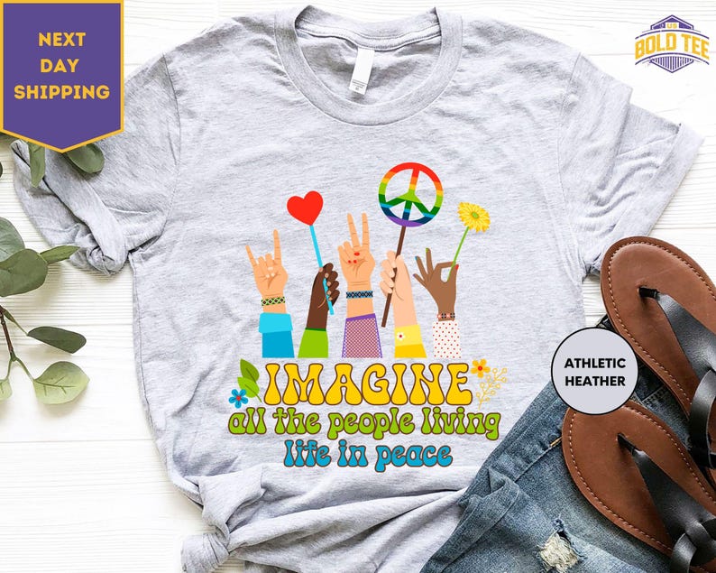 a t - shirt that says imagine all the people living life in peace