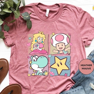 a pink tshirt with mario and friends on it