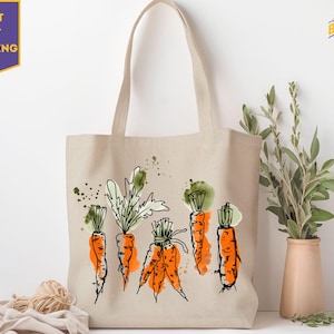 a tote bag with carrots on it next to a potted plant
